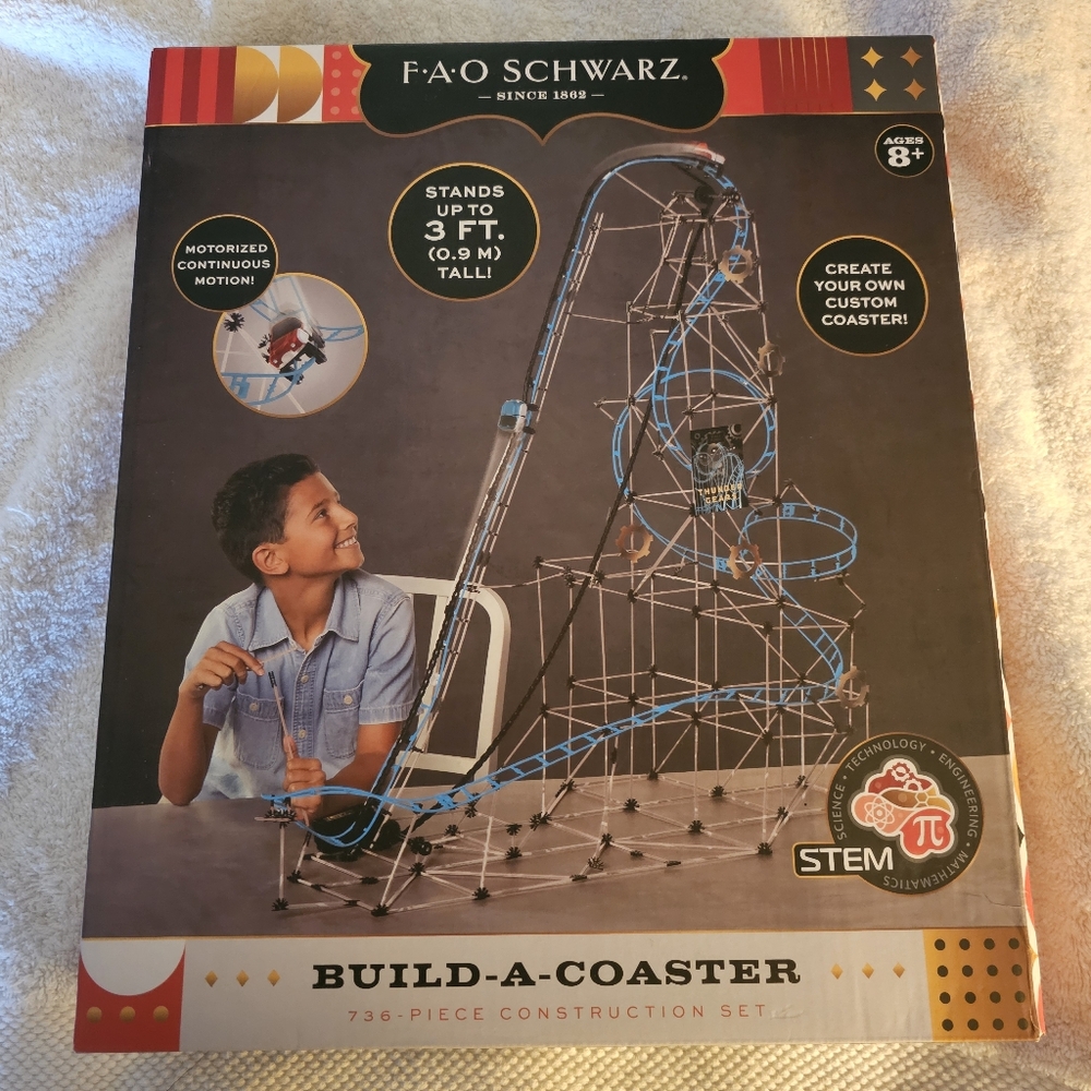 New in box. FAO SWARTZ Build-a-Coaster 736 piece construction set.